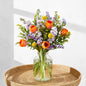 Vibrant Spring Bouquet with Orange Tulips, Yellow Billy Balls, and Light Purple Stocks