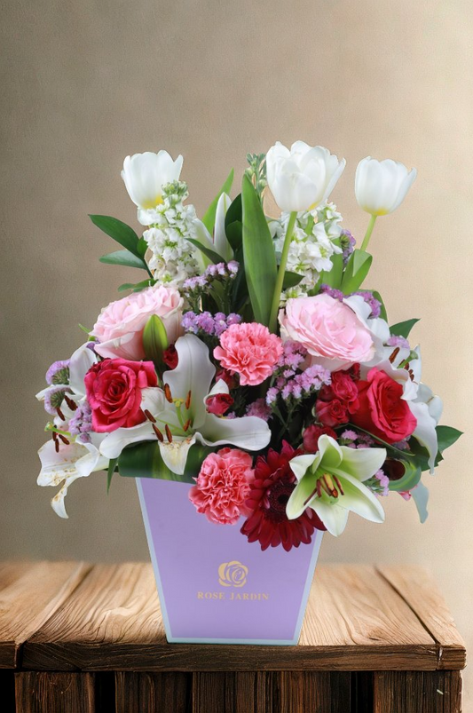 Elegant Floral Arrangement in a Lavender Vase